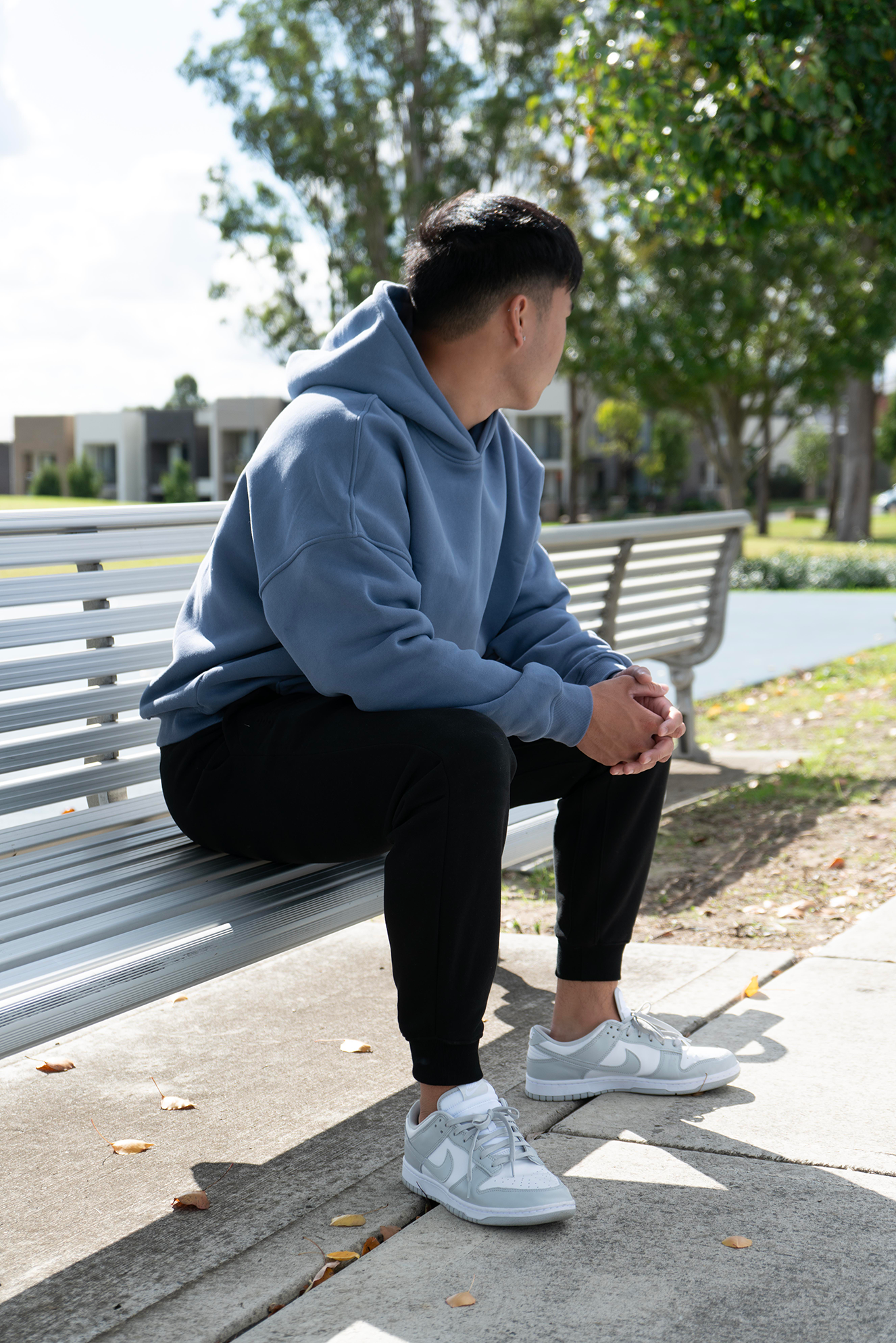 wearing an oversized, cozy hoodie ideal for sydney winter warmth
