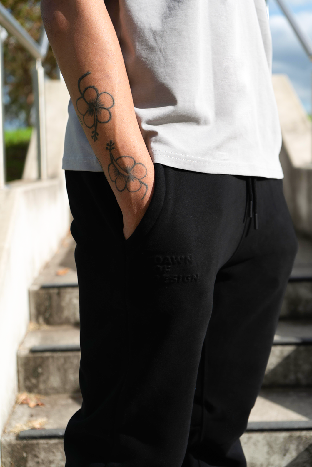 Laid-back outfit with a minimalist boxy t-shirt and comfy trackies 